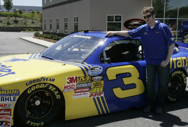 MOORESVILLE, NC - APRIL 29: Dale Earnhardt Jr., co-owner of JR Motorsports, stands with the #3 Wrangler car that he will drive in the Nationwide race in Daytona later this year, after the unveiling on April 29, 2010 in Mooresville, North Carolina. (Photo by Mary Ann Chastain/Getty Images for NASCAR)