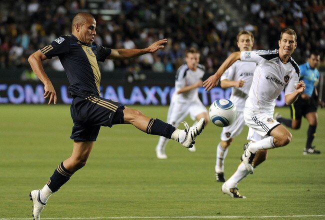 CARSON, CA - MAY 01:  Fred #6 of the Philadelphia Union takes a pass in front of Gregg Berhalter #16 of the Los Angeles Galaxy during the first half at the Home Depot Center on May 1, 2010 in Carson, California.  (Photo by Harry How/Getty Images)