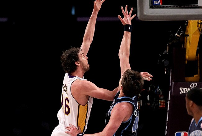 LOS ANGELES - MAY 2:  Pau Gasol #16 of the Los Angeles Lakers shoots over Kyle Korver #26 of the Utah Jazz during Game One of the Western Conference Semifinals of the 2010 NBA Playoffs on May2, 2010 at Staples Center in Los Angeles, California.  NOTE TO USER: User expressly acknowledges and agrees that, by downloading and/or using this Photograph, user is consenting to the terms and conditions of the Getty Images License Agreement. (Photo by Stephen Dunn/Getty Images)
