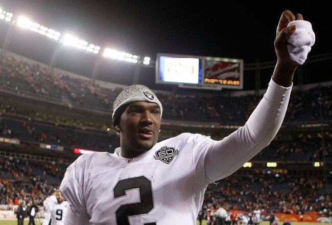 DENVER - DECEMBER 20:  Quarterback JaMarcus Russell #2 celebrates following the Oakland Raiders' victory over the Denver Broncos at Invesco Field at Mile High on December 20, 2009 in Denver, Colorado. The Raiders defeated the Broncos 20-19.  (Photo by Jeff Gross/Getty Images)