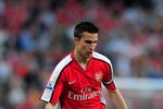 LONDON, ENGLAND - APRIL 24:  Robin Van Persie of Arsenal controls the ball during the Barclays Premier League match between Arsenal and Manchester City at the Emirates Stadium on April 24, 2010 in London, England.  (Photo by Shaun Botterill/Getty Images)