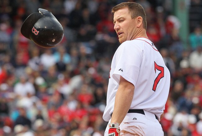 BOSTON - APRIL 25:  J.D. Drew #7 of the Boston Red Sox reacts after making an out against the Baltimore Orioles at Fenway Park on April 25, 2010 in Boston, Massachusetts.  (Photo by Jim Rogash/Getty Images)