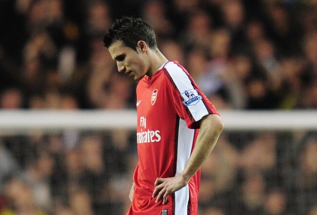 LONDON, ENGLAND - APRIL 14:  Robin Van Persie of Arsenal walks off dejected after the Barclays Premier League match between Tottenham Hotspur and Arsenal at White Hart Lane on April 14, 2010 in London, England.  (Photo by Shaun Botterill/Getty Images)