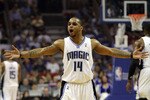 ORLANDO, FL - APRIL 21:  Jameer Nelson #14 of the Orlando Magic prostests to an official while taking on the Charlotte Bobcats in Game Two of the Eastern Conference Quarterfinals during the 2010 NBA Playoffs at Amway Arena on April 21, 2010 in Orlando, Florida. NOTE TO USER: User expressly acknowledges and agrees that, by downloading and/or using this Photograph, user is consenting to the terms and conditions of the Getty Images License Agreement.  (Photo by Doug Benc/Getty Images)