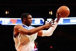 NEW YORK - APRIL 17:  Terrence Jones #1 of West Team goes for a shot against Perry Jones #3 and Jelan Kendrick #45 of East Team during the National Game at the 2010 Jordan Brand classic at Madison Square Garden on April 17, 2010 in New York City.  (Photo by Jeff Zelevansky/Getty Images for Jordan Brand Classic)