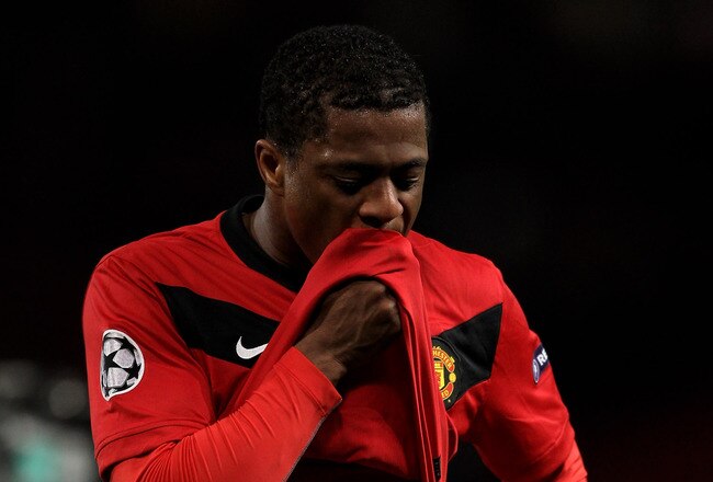 MANCHESTER, ENGLAND - APRIL 07:  Patrice Evra of Manchester United looks dejected at the end of the UEFA Champions League Quarter Final second leg match between Manchester United and Bayern Muenchen at Old Trafford on April 7, 2010 in Manchester, England.  (Photo by Alex Livesey/Getty Images)