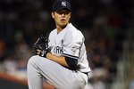 NEW YORK - JUNE 28:  Chien-Ming Wang #40 of the New York Yankees pitches against the New York Mets on June 28, 2009 at Citi Field in the Flushing neighborhood of the Queens borough of New York City.  (Photo by Jim McIsaac/Getty Images)