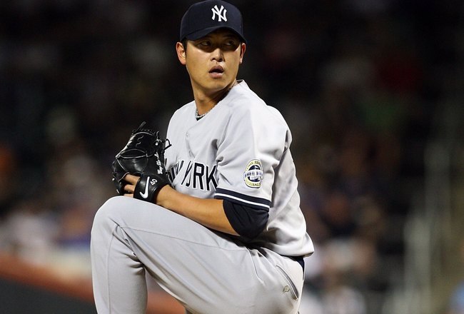 NEW YORK - JUNE 28:  Chien-Ming Wang #40 of the New York Yankees pitches against the New York Mets on June 28, 2009 at Citi Field in the Flushing neighborhood of the Queens borough of New York City.  (Photo by Jim McIsaac/Getty Images)
