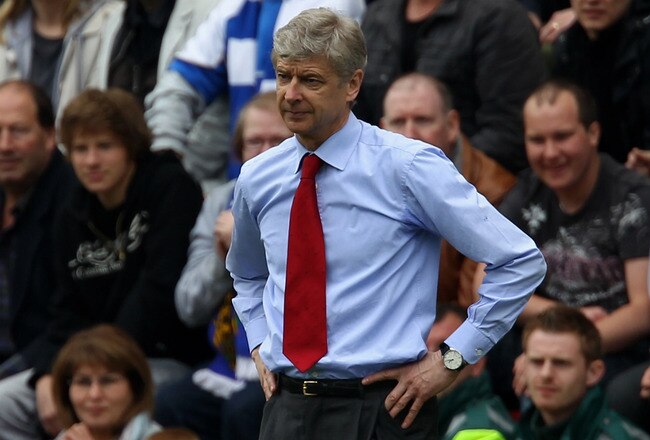 WIGAN, ENGLAND - APRIL 18:  Arsene Wenger the manager of Arsenal looks on during the Barclays Premier League match between Wigan Athletic and Arsenal at the DW Stadium on April 18, 2010 in Wigan, England.  (Photo by Alex Livesey/Getty Images)