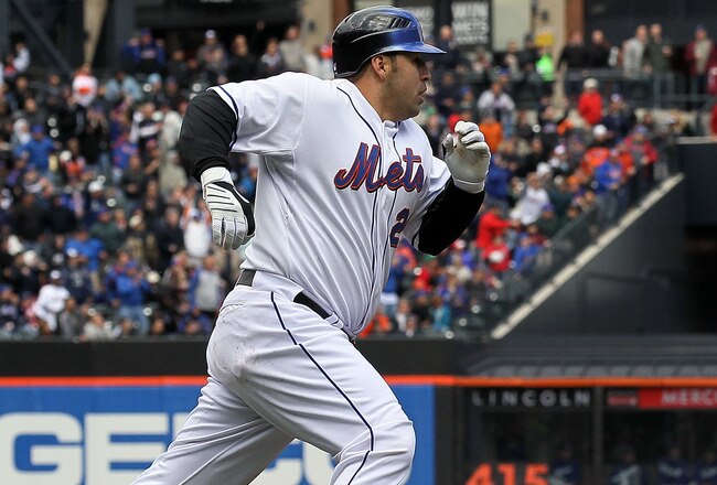 NEW YORK - APRIL 28:  Rod Barajas #21 of the New York Mets scores a second inning run against the Los Angeles Dodgers on a triple from teammate Angel Pagan (not pictured) on April 28, 2010 at Citi Field in the Flushing neighborhood of the Queens borough of New York City.  (Photo by Jim McIsaac/Getty Images)