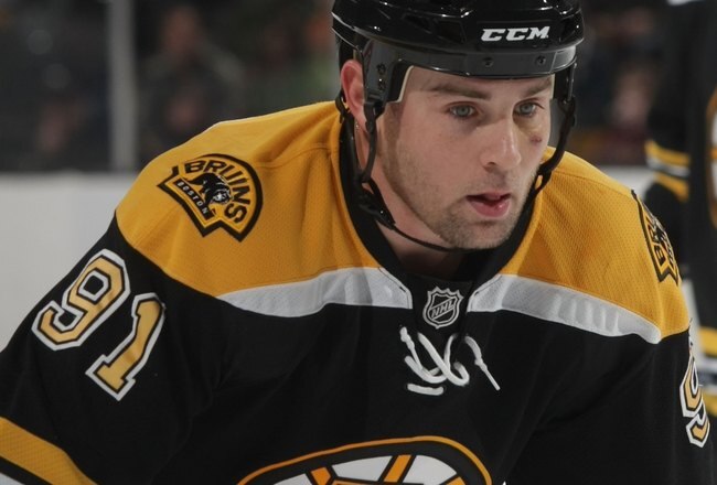 BOSTON - DECEMBER 02:  Marc Savard #91 of the Boston Bruins skates against the Tampa Bay Lightning at the TD Bank Garden on December 2, 2009 in Boston, Massachusetts.  (Photo by Bruce Bennett/Getty Images)