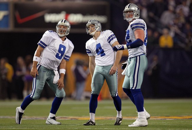 MINNEAPOLIS - JANUARY 17:  Quarterback Tony Romo #9, Shaun Suisham #4 and Jason Witten #82 of the Dallas Cowboys look on while playing against the Minnesota Vikings during the NFC Divisional Playoff Game at Hubert H. Humphrey Metrodome on January 17, 2010 in Minneapolis, Minnesota. The Vikings defeated the Cowboys 34-3. (Photo by Chris McGrath/Getty Images)
