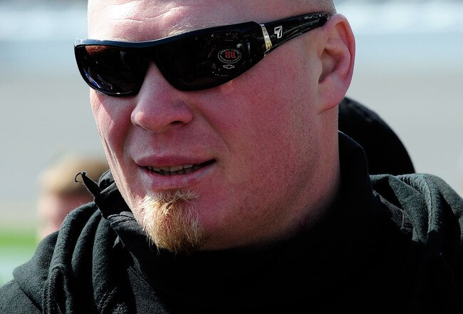 DAYTONA BEACH, FL - FEBRUARY 13:  MMA fighter Brock Lesnar walks in the garage area during the NASCAR Nationwide Series Drive4COPD 300 at Daytona International Speedway on February 13, 2010 in Daytona Beach, Florida.  (Photo by Sam Greenwood/Getty Images)