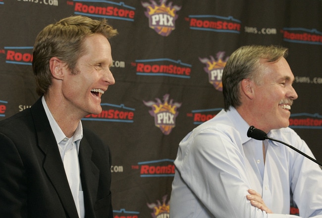 PHOENIX - FEBRUARY 6:  Phoenix Suns General Manager Steve Kerr and Head Coach Mike D'Antoni (R) speak in a pregame interview in regards to the Suns' acquisition of Shaquille O'Neal before Suns host New Orleans Hornets in an NBA game played at U.S. Airways Center February 6, 2008 in Phoenix, Arizona. NOTE TO USER: User expressly acknowledges and agrees that, by downloading and or using this Photograph, user is consenting to the terms and conditions of the Getty Images License Agreement.  (Photo by Domenic Centofanti/Getty Images)