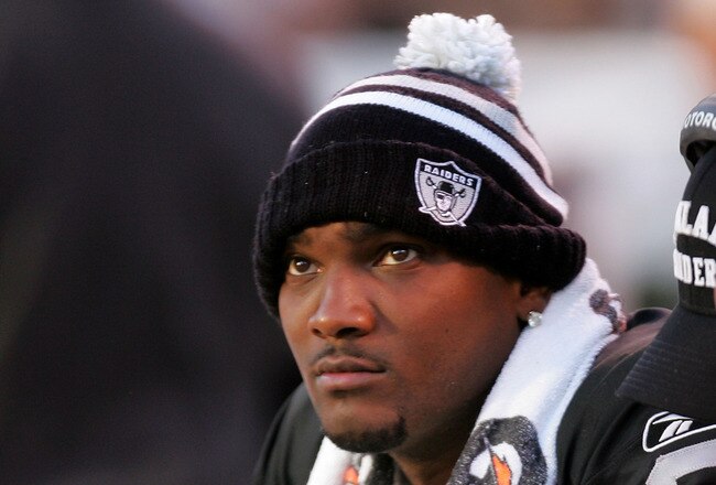 OAKLAND, CA - NOVEMBER 15:  JaMarcus Russell #2 of the Oakland Raiders sits on the bench after being taken out of their game against the Kansas City Chiefs at Oakland-Alameda County Coliseum on November 15, 2009 in Oakland, California.  (Photo by Ezra Shaw/Getty Images)
