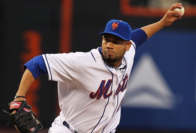 NEW YORK - APRIL 27:  Pedro Feliciano #25 of the New York Mets pithches against the Los Angeles Dodgers during their game on April 27, 2010 at Citi Field in the Flushing neighborhood of the Queens borough of New York City.  (Photo by Al Bello/Getty Images)