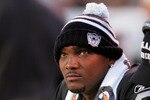 OAKLAND, CA - NOVEMBER 15:  JaMarcus Russell #2 of the Oakland Raiders sits on the bench after being taken out of their game against the Kansas City Chiefs at Oakland-Alameda County Coliseum on November 15, 2009 in Oakland, California.  (Photo by Ezra Shaw/Getty Images)