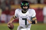 LOS ANGELES - NOVEMBER 11:  Nathan Costa #7 of the Oregon Ducks runs with the ball during the game against the USC Trojans on November 11, 2006 at the Los Angeles Memorial Coliseum in Los Angeles, California. (Photo by Stephen Dunn/Getty Images)