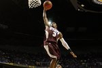 NASHVILLE, TN - MARCH 14:  Dee Bost #3 of the Mississippi State Bulldogs dunks against the Kentucky Wildcats during the final of the SEC Men's Basketball Tournament at the Bridgestone Arena on March 14, 2010 in Nashville, Tennessee. Kentucky won 75-74 in overtime. (Photo by Andy Lyons/Getty Images)