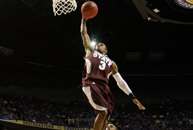 NASHVILLE, TN - MARCH 14:  Dee Bost #3 of the Mississippi State Bulldogs dunks against the Kentucky Wildcats during the final of the SEC Men's Basketball Tournament at the Bridgestone Arena on March 14, 2010 in Nashville, Tennessee. Kentucky won 75-74 in overtime. (Photo by Andy Lyons/Getty Images)