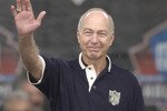 CANTON, OH - AUGUST 3:  Pro Football Hall of Famer (Class of 1977) Bart Starr waves to the crowd as he is introduced during the 2003 NFL Hall of Fame Induction ceremony on August 3, 2003 in Canton, Ohio.  (Photo by David Maxwell/Getty Images)