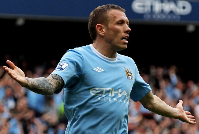 MANCHESTER, ENGLAND - MAY 01:  Craig Bellamy of Manchester City celebrates after scoring his team's third goal during the Barclays Premier League match between Manchester City and Aston Villa at the City of Manchester Stadium on May 1, 2010 in Manchester, England.  (Photo by Alex Livesey/Getty Images)