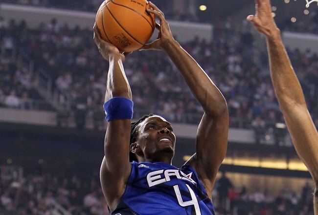 ARLINGTON, TX - FEBRUARY 14:  Chris Bosh #4 of the Eastern Conference shoots against Tim Duncan #21 of the Western Conference during the NBA All-Star Game, part of 2010 NBA All-Star Weekend at Cowboys Stadium on February 14, 2010 in Arlington, Texas. The Eastern Conference defeated the Western Conference 141-139 in regulation. NOTE TO USER: User expressly acknowledges and agrees that, by downloading and or using this photograph, User is consenting to the terms and conditions of the Getty Images License Agreement.  (Photo by Jed Jacobsohn/Getty Images)