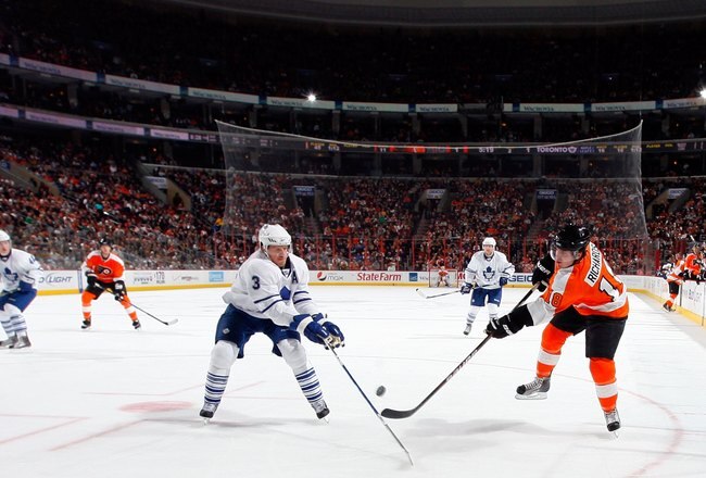 PHILADELPHIA - MARCH 07:  Dion Phaneuf #3 of the Toronto Maple Leafs defends against Mike Richards #18 of the Philadelphia Flyers on March 7, 2010 at Wachovia Center in Philadelphia, Pennsylvania. The Flyers defeated the Leafs 3-1.  (Photo by Jim McIsaac/Getty Images)