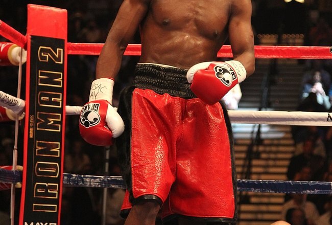 LAS VEGAS - MAY 01:  Floyd Mayweather Jr. looks on at the start of his welterweight fight against Shane Mosley at the MGM Grand Garden Arena on May 1, 2010 in Las Vegas, Nevada.  (Photo by Jed Jacobsohn/Getty Images)