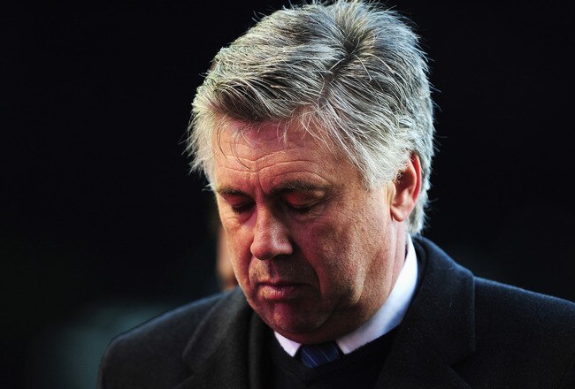 BIRMINGHAM, ENGLAND - DECEMBER 26: Carlo Ancelotti, Manager of Chelsea looks dejected as he walks off after the Barclays Premier League match between Birmingham City and Chelsea at St. Andrew's Stadium on December 26, 2009 in Birmingham, England.  (Photo by Clive Mason/Getty Images)