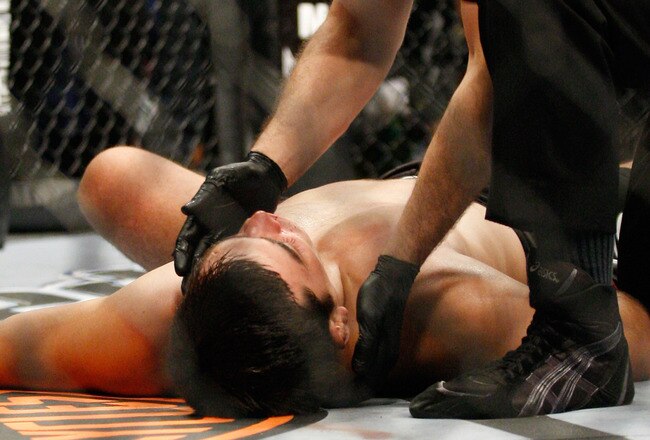 MONTREAL- MAY 8: Lyoto Machida lies on the mat after been defeated by Mauricio 'Shogun' Rua in their light heavyweight bout at UFC 113 at Bell Centre on May 8, 2010 in Montreal, Quebec, Canada.  Mauricio 'Shogun' Rua won the bout by KO.  (Photo by Richard Wolowicz/Getty Images)