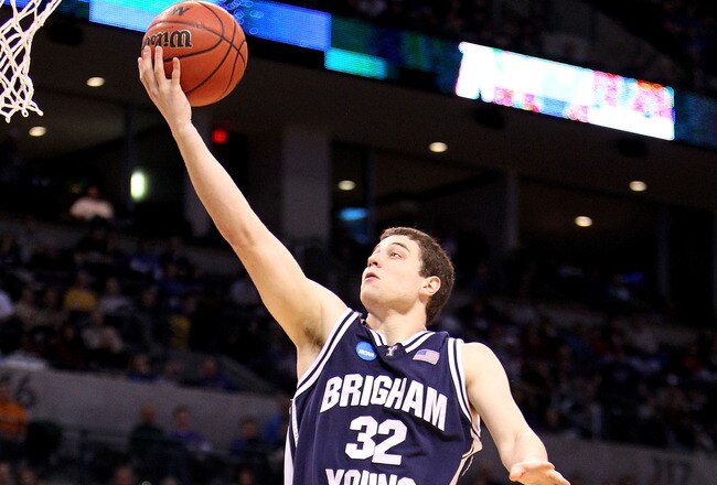 OKLAHOMA CITY - MARCH 20:  Jimmer Fredette #32 of the Brigham Young Cougars drives for a shot attempt against the Kansas State Wildcats during the second round of the 2010 NCAA men's basketball tournament at Ford Center on March 20, 2010 in Oklahoma City, Oklahoma.  (Photo by Ronald Martinez/Getty Images)