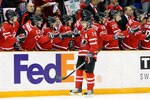 SASKATOON, SK - JANUARY 3:  Jordan Eberle #14 of Team Canada celebrates his first period goal with team mates during the 2010 IIHF World Junior Championship Tournament Semifinal game against Team Switzerland on January 3, 2010 at the Credit Union Centre in Saskatoon, Saskatchewan, Canada.  (Photo by Richard Wolowicz/Getty Images)