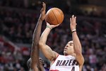 PORTLAND, OR - APRIL 29:  Jerryd Bayless #4 of the Portland Trail Blazers in action against the Phoenix Suns during Game Six of the Western Conference Quarterfinals of the NBA Playoffs on April 29, 2010 at the Rose Garden in Portland, Oregon. The Suns defeated the Blazers 99-90. NOTE TO USER: User expressly acknowledges and agrees that, by downloading and or using this Photograph, user is consenting to the terms and conditions of the Getty Images License Agreement. (Photo by Otto Greule Jr/Getty Images)