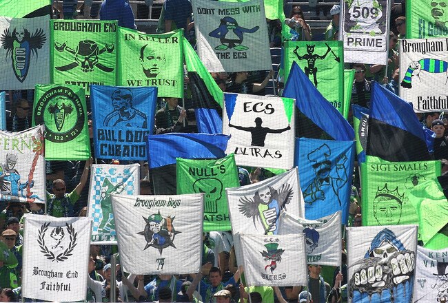 SEATTLE - MAY 08:  Fans of the Seattle Sounders FC hold signs prior to the game against the Los Angeles Galaxy on May 8, 2010 at Qwest Field in Seattle, Washington. The Galaxy defeated the Sounders 4-0.(Photo by Otto Greule Jr/Getty Images)