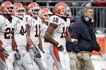 COLUMBUS - NOVEMBER 10:  Head coach Ron Zook (R) of the Illinois Fighting Illini walks with players on the sideline during the first quarter against the Ohio State Buckeyes at Ohio Stadium November 10, 2007 in Columbus, Ohio. Illinois defeated Ohio State 28-21.  (Photo by David Maxwell/Getty Images)