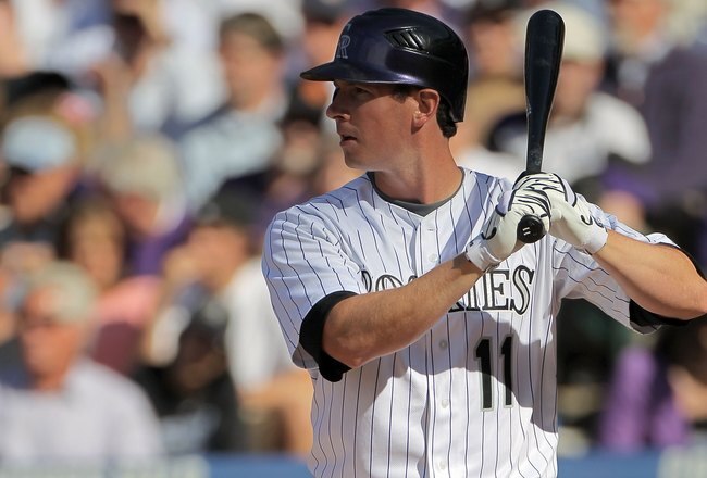 DENVER - APRIL 09:  Brad Hawpe #11 of the Colorado Rockies takes an at bat against the San Diego Padres during MLB action on Opening Day at Coors Field on April 9, 2010 in Denver, Colorado. The Rockies defeated the Padres 7-0.  (Photo by Doug Pensinger/Getty Images)