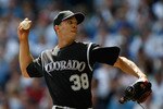 MILWAUKEE, WI - APRIL 05: Pitcher Ubaldo Jimenez #38 of the Colorado Rockies pitches the baseball against the Milwaukee Brewers at the Miller Park on April 05, 2010 in Milwaukee, Wisconsin. The Rockies defeated the Brewers 5-3.(Photo by Scott Boehm/Getty Images)