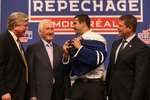 MONTREAL - JUNE 26:  (L-R)  Toronto Maple Leafs President & GM Brian Burke, Special Advisor Cliff Fletcher, First Round Draft Pick Nazem Kadri and Senior VP of Hockey Operations Dave Nonis stand on the stage during the first round of the 2009 NHL Entry Draft at the Bell Centre on June 26, 2009 in Montreal, Quebec, Canada. (Photo by Bruce Bennett/Getty Images)