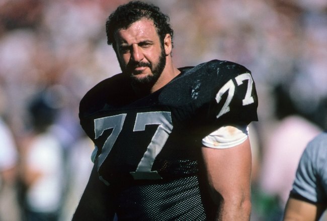 LOS ANGELES, CA - SEPTEMBER 22:  Lyle Alzado #77 of the Los Angeles Raiders stands on the field during the game against the San Francisco 49ers at the Los Angeles Memorial Coliseum on September 22, 1985 in Los Angeles, California.  The 49ers won 34-10. (Photo by George Rose/Getty Images)