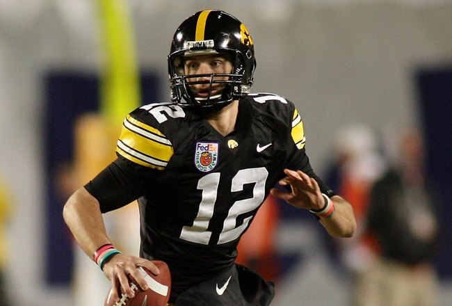 MIAMI GARDENS, FL - JANUARY 05:  Quarterback Richy Stanzi #12 of the Iowa Hawkeyes rolls out of the pocket against the Georgia Tech Yellow Jackets during the FedEx Orange Bowl at Land Shark Stadium on January 5, 2010 in Miami Gardens, Florida. Iowa won 24-14.  (Photo by Marc Serota/Getty Images)