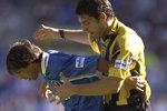 27 Jul 1997:  Gianfranco Zola of Chelsea is held up by Slaven Bilic of Everton during the Umbro Cup match at Goodison Park in Liverpool, England. \ Mandatory Credit: Ben Radford /Allsport