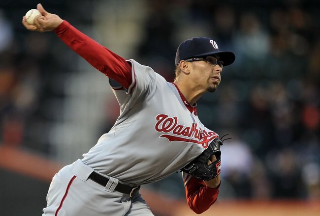 NEW YORK - MAY 10:  Luis Atilano #56 of the Washington Nationals delivers a pitch against the New York Mets on May 10, 2010 at Citi Field in the Flushing neighborhood of the Queens borough of New York City.  (Photo by Jim McIsaac/Getty Images)