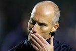 CARSON, CA - JANUARY 23:  Head Coach Bob Bradley walks off the pitch after their international friendly match against Honduras on January 23, 2010 in Carson, California. Honduras defeated USA 3-1.  (Photo by Victor Decolongon/Getty Images)
