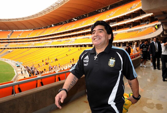 JOHANNESBURG, SOUTH AFRICA - JANUARY 21:  In this handout image provided by the 2010 FIFA World Cup Organising Committee South Africa, Argentina head coach Diego Maradona visits Soccer City Stadium, which will stage the opening match and final of the 2010 FIFA World Cup, on January 21, 2010 in Johannesburg, South Africa.  (Photo by 2010 FIFA World Cup Organising Committee South Africa via Getty Images)