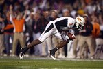 SAN DIEGO, CA - DECEMBER 30:   Wide Receiver Dez Bryant  #1 of the Oklahoma State University Cowboys catches the ball and runs in for a touchdown against the University of Oregon Ducks during the Pacific Life Holiday Bowl at Qualcomm Stadium on December 30, 2008 in San Diego, California. (Photo by Donald Miralle/Getty Images)