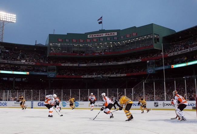 BOSTON, MA - JANUARY 01:  The Philadelphia Flyers skate against the Boston Bruins during the 2010 Bridgestone Winter Classic at Fenway Park on January 1, 2010  in Boston, Massachusetts.  (Photo by Jim McIsaac/Getty Images)