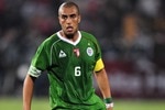 CAIRO, EGYPT - NOVEMBER 14:  Yasid Mansouri of Algeria during the FIFA2010 World Cup qualifying match  between Egypt and Algeria at the Cairo International Stadium on November 14, 2009 in Cairo, Egypt.  (Photo by Clive Mason/Getty Images)