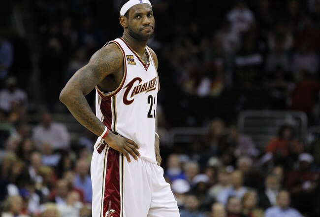 CLEVELAND - MAY 11: LeBron James #23 of the Cleveland Cavaliers looks on while playing the Boston Celtics in Game Five of the Eastern Conference Semifinals during the 2010 NBA Playoffs at Quicken Loans Arena on May 11, 2010 in Cleveland, Ohio. Boston won the game 120-88 to take a 3-2 series lead. NOTE TO USER: User expressly acknowledges and agrees that, by downloading and or using this photograph, User is consenting to the terms and conditions of the Getty Images License Agreement.  (Photo by Gregory Shamus/Getty Images)