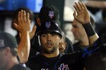 NEW YORK - JUNE 19:  Carlos Beltran #15 of the New York Mets celebrates in the dugout after scoring in the eigth inning against the Tampa Bay Rays on June 19, 2009 at Citi Field in the Flushing neighborhood of the Queens borough of New York City.  (Photo by Jim McIsaac/Getty Images)